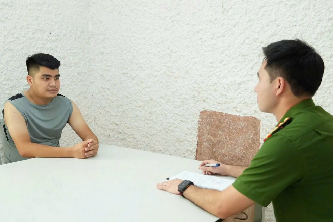 Cơ quan điều tra lấy lời khai đối tượng Nguyễn Bá Nghĩa.jpg