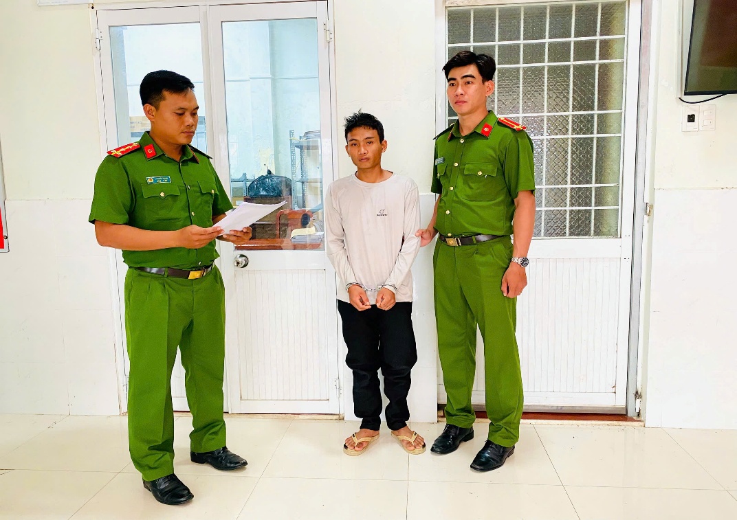 Đối tượng Trương Đan Huy tại cơ quan Công an.jpg