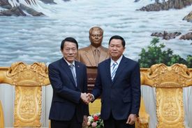Minister Luong Tam Quang meets with newly appointed Lao Minister of Public Security